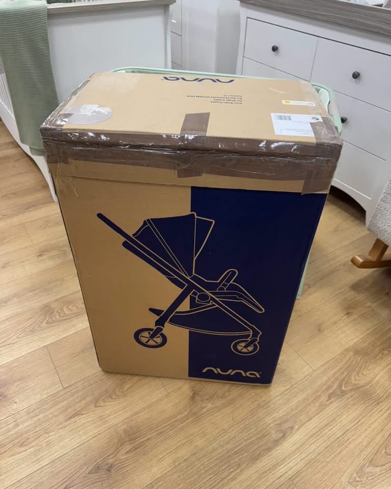 Nuna Swiv Open box Chateau