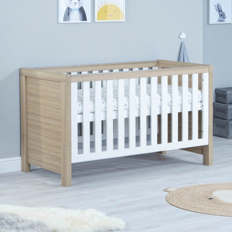 Babymore Luno Cot Bed-Oak & White *AUGUST OFFER FREE COT TOP CHANGER